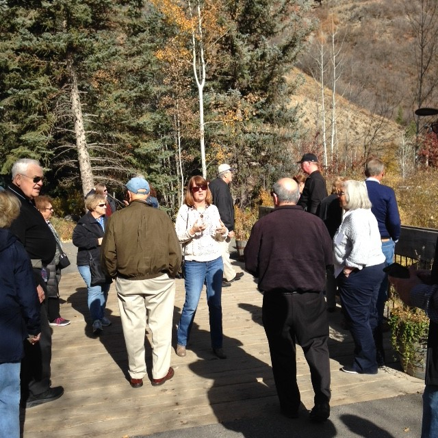 Wendy Hoenig speaking to the group about Sundance as we stood on bridge overlooking a flowing stream